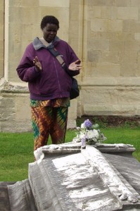 A visiting Mothers' Union worker prays at the Mary Sumner's grave